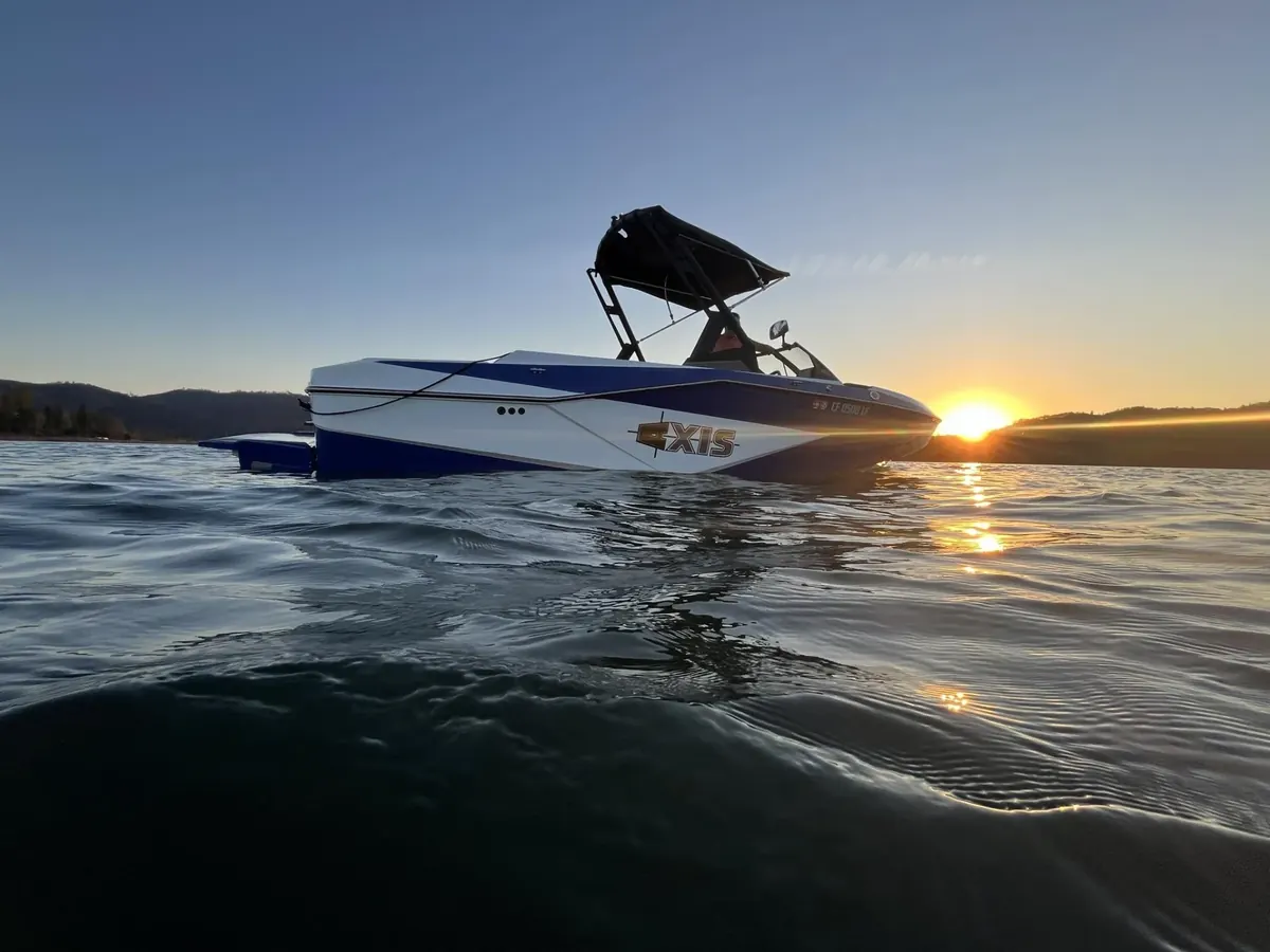 Axis wakeboard boat rental on Shasta Lake at sunset