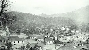 Historic black and white photograph of Kennett California gold rush mining town in the early 1900s