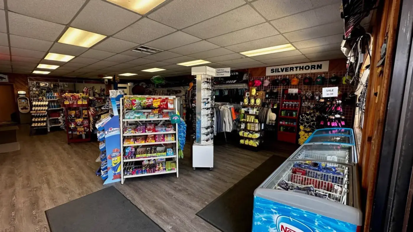 Inside the Silverthorn Marina Market and apparel shop with snacks, sunglasses and resort apparel