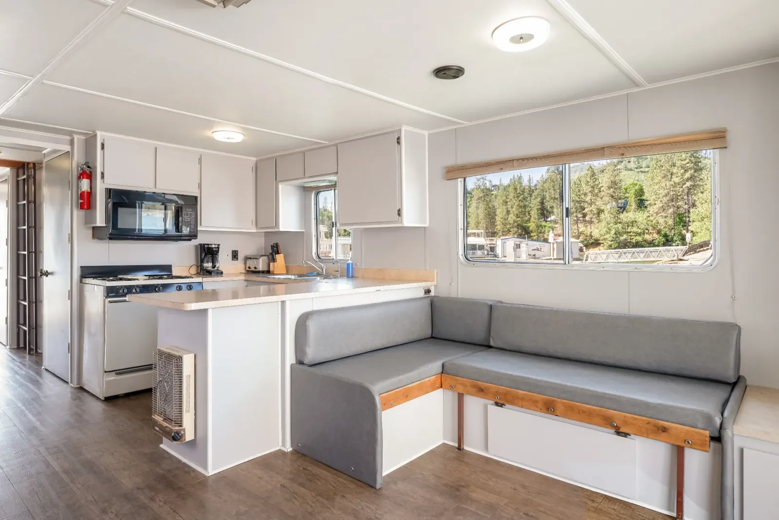 Senator houseboat fully equipped gourmet kitchen with modern appliances and open living room interior