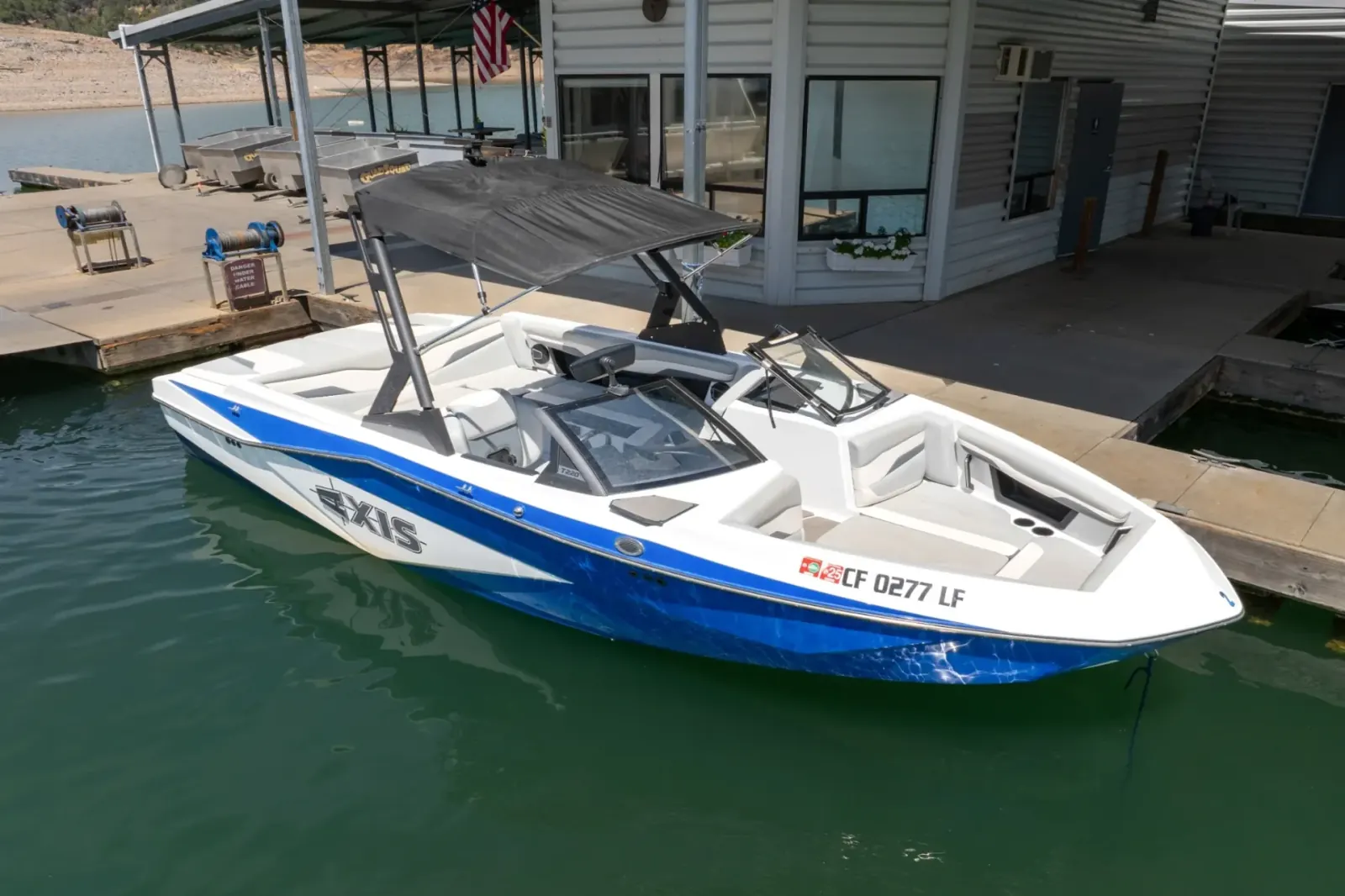 Axis T220-R docked with overhead bow view at Silverthorn Resort marina on Shasta Lake