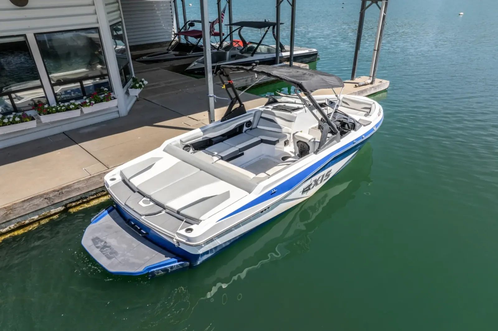 Axis T220-R stern swim platform view while docked at Silverthorn Resort on Shasta Lake