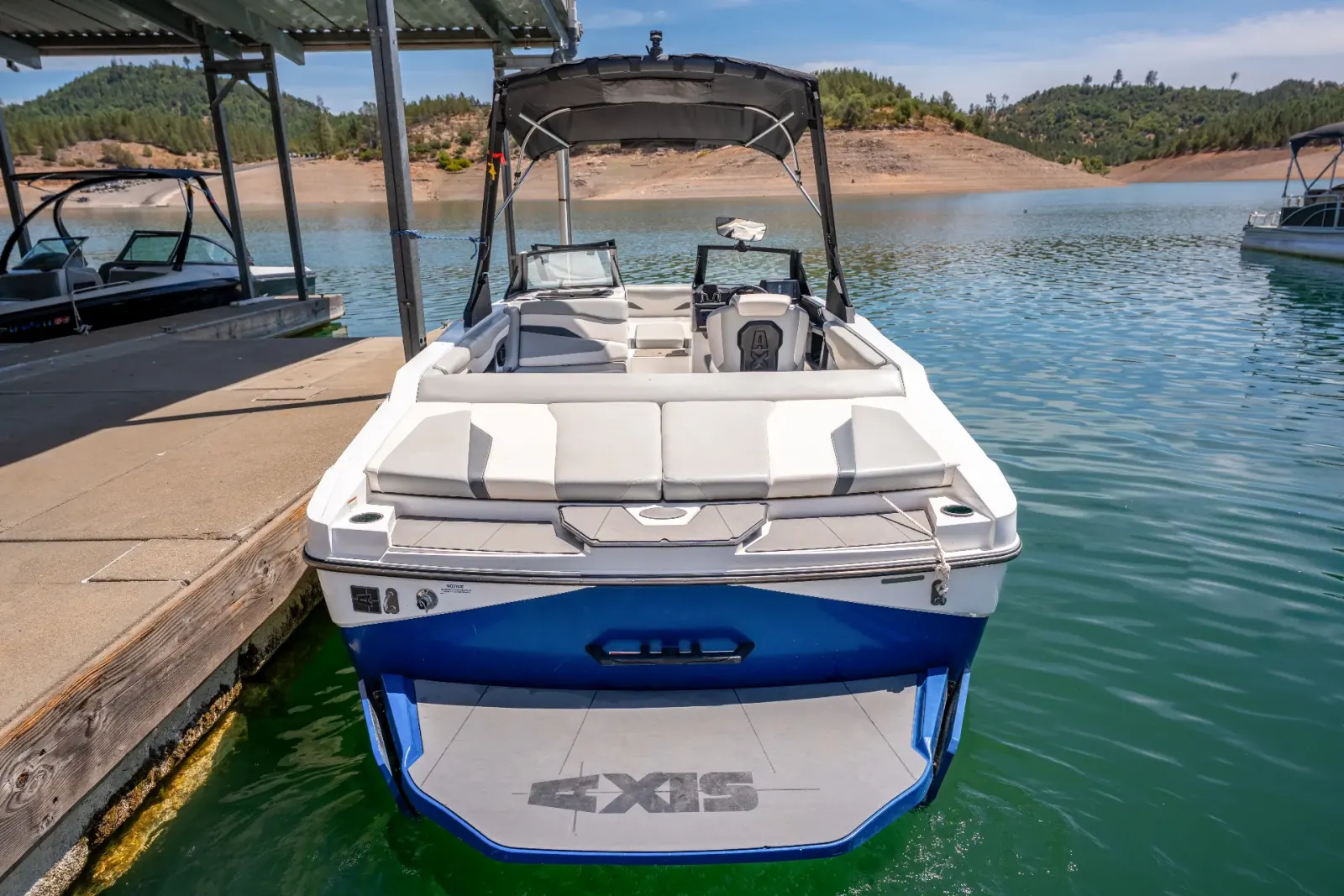 Centurion T-5 stern swim platform and seating while docked at Silverthorn Resort on Shasta Lake
