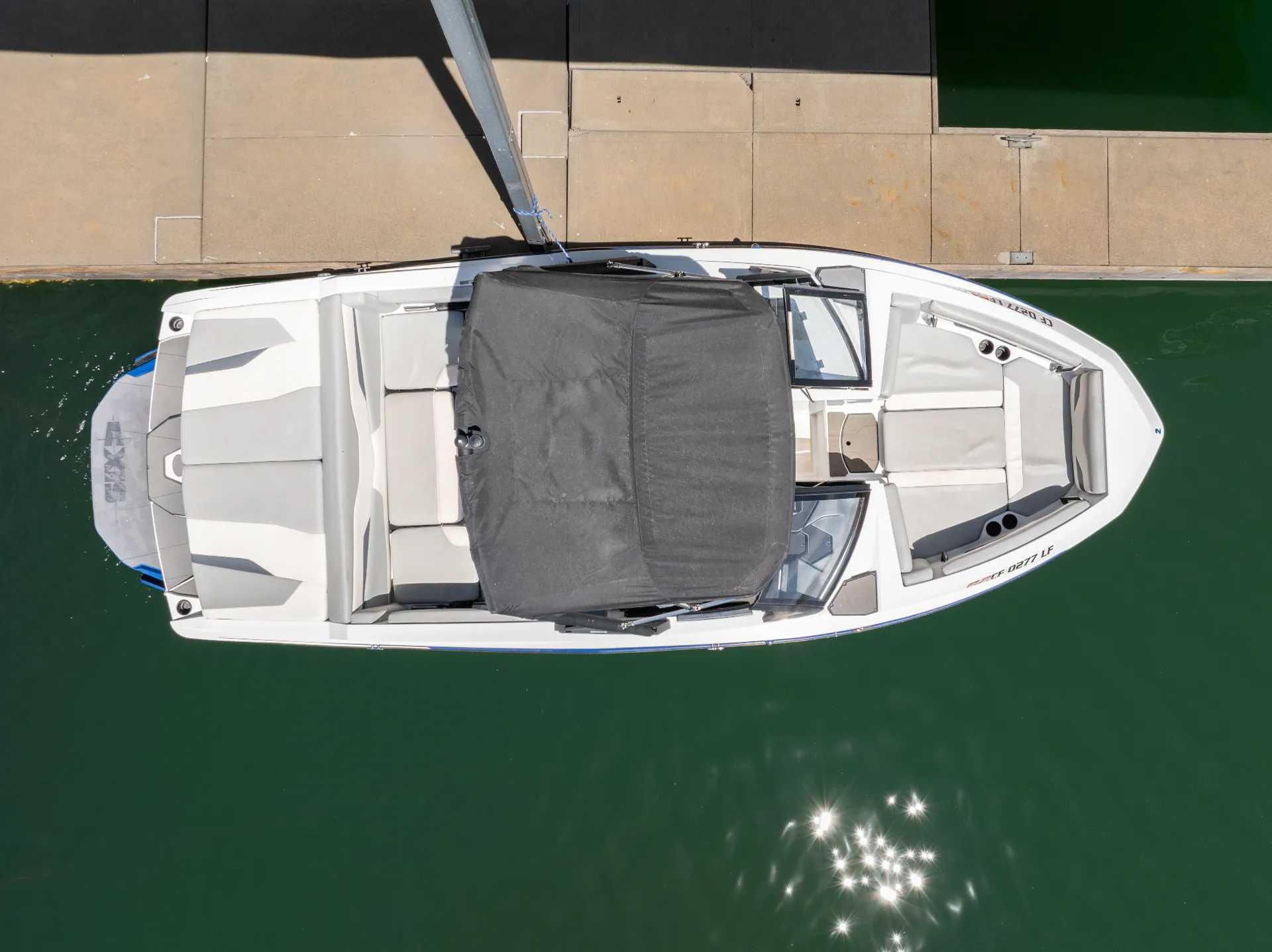Centurion T-5 top-down aerial view with bimini cover at Silverthorn Resort on Shasta Lake