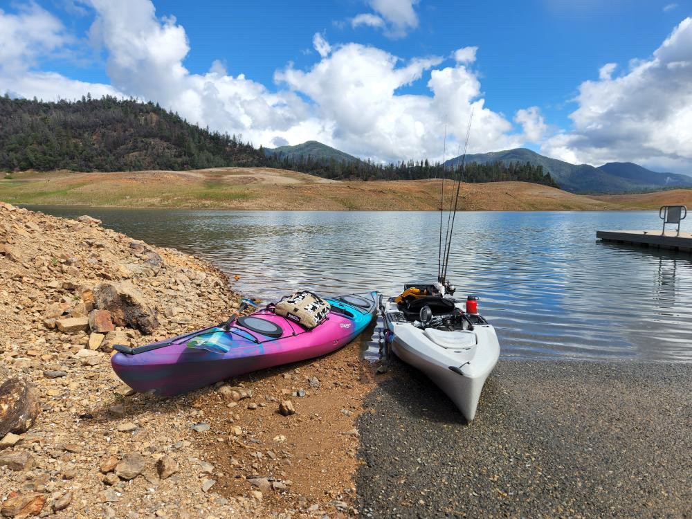 Paddling through the Pit River Arm on Shasta Lake by kayak