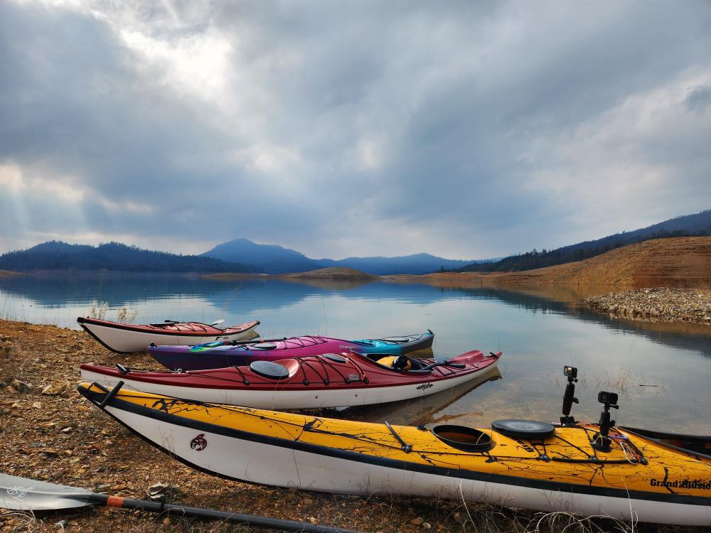 Scenic shoreline view from a kayak on Shasta Lake