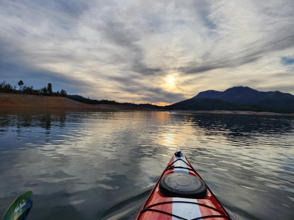 Golden hour sunset kayaking on Shasta Lake