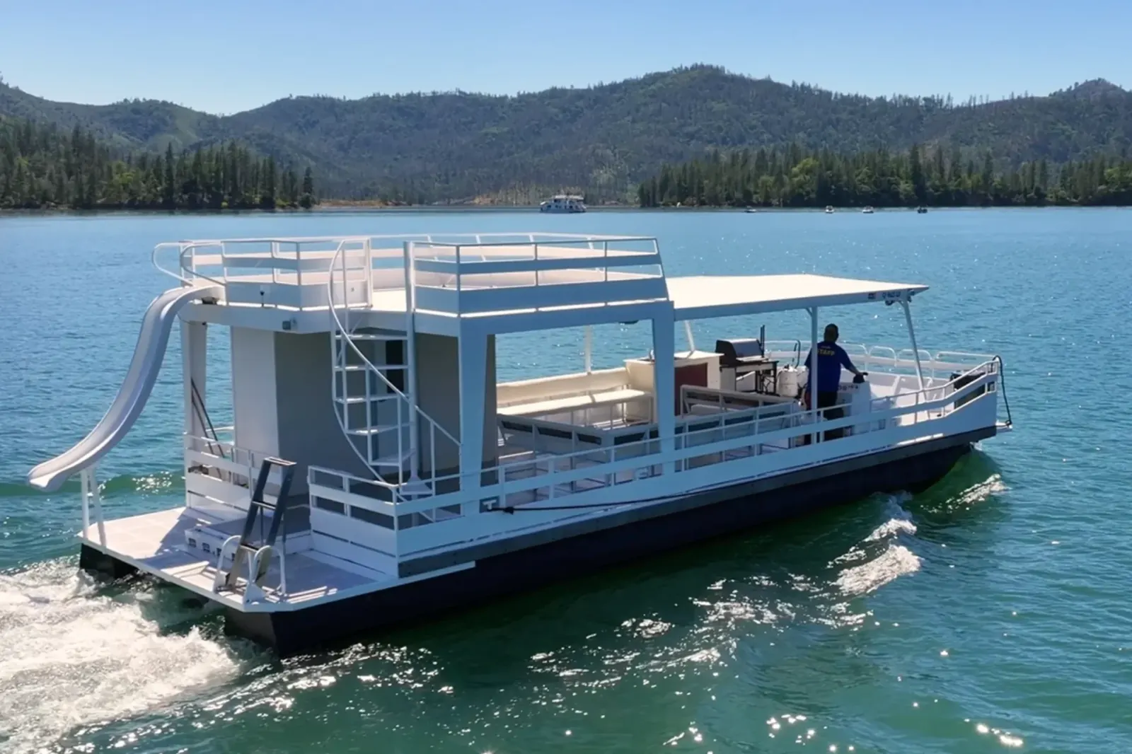 Party Cruiser I rear view showing waterslide and upper deck on Shasta Lake